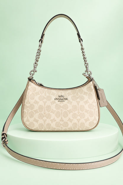Elegant Monogram Shoulder Bag with Chain Handle & Adjustable Crossbody Strap