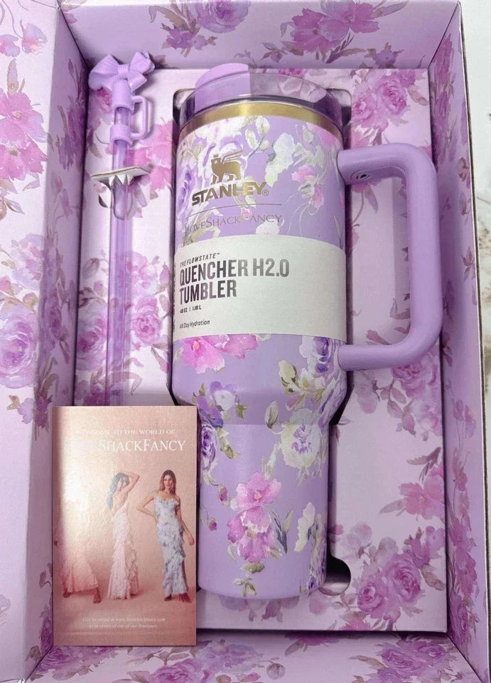 Floral-patterned tumbler in a decorative box with a card inside.