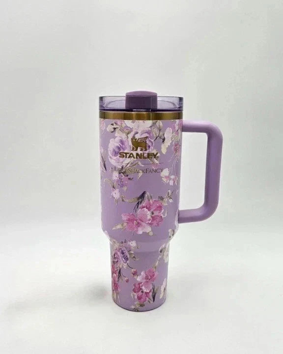 Floral-patterned Stanley tumbler on a white background